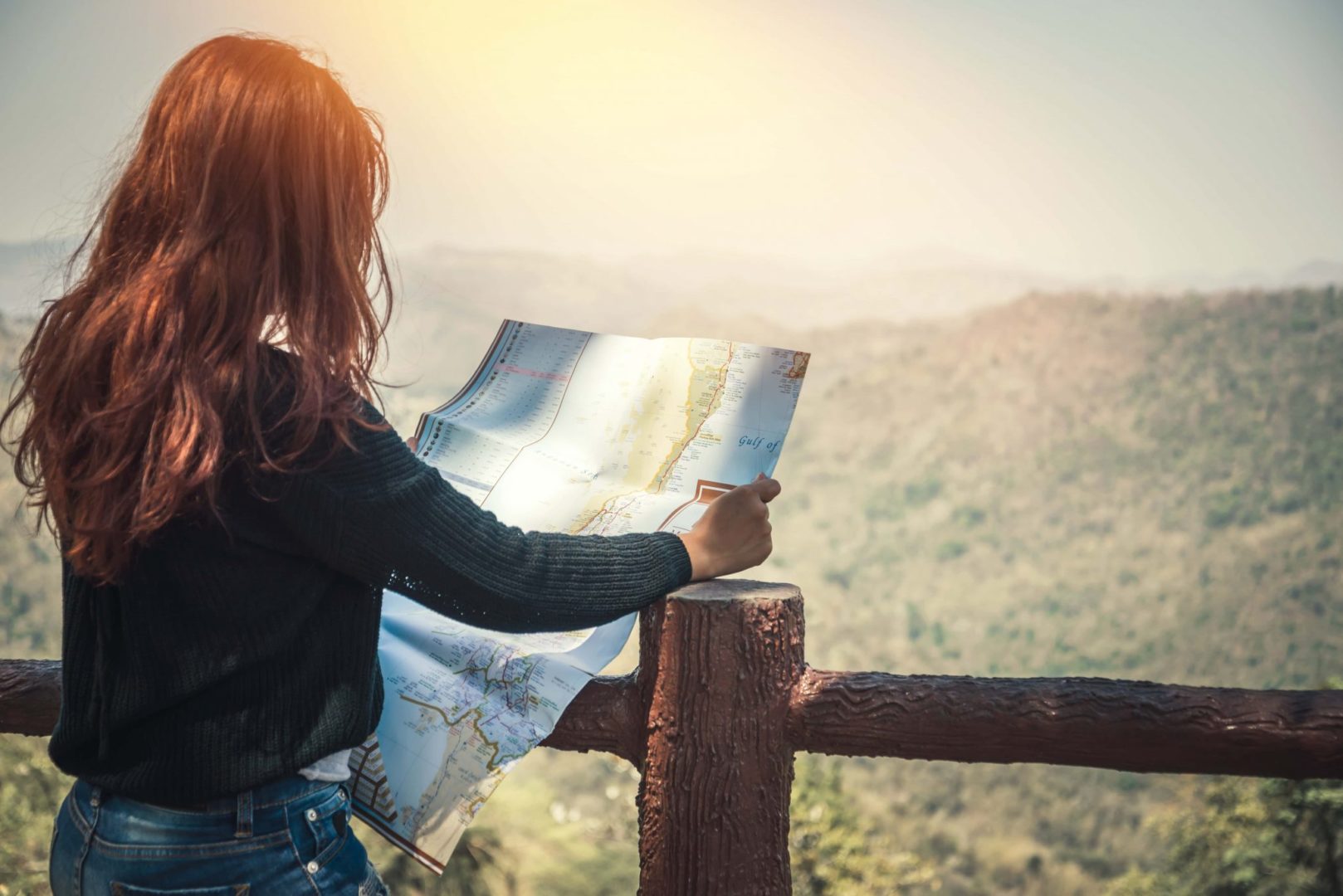 Choose your own adventure like the red haired woman reading a map.