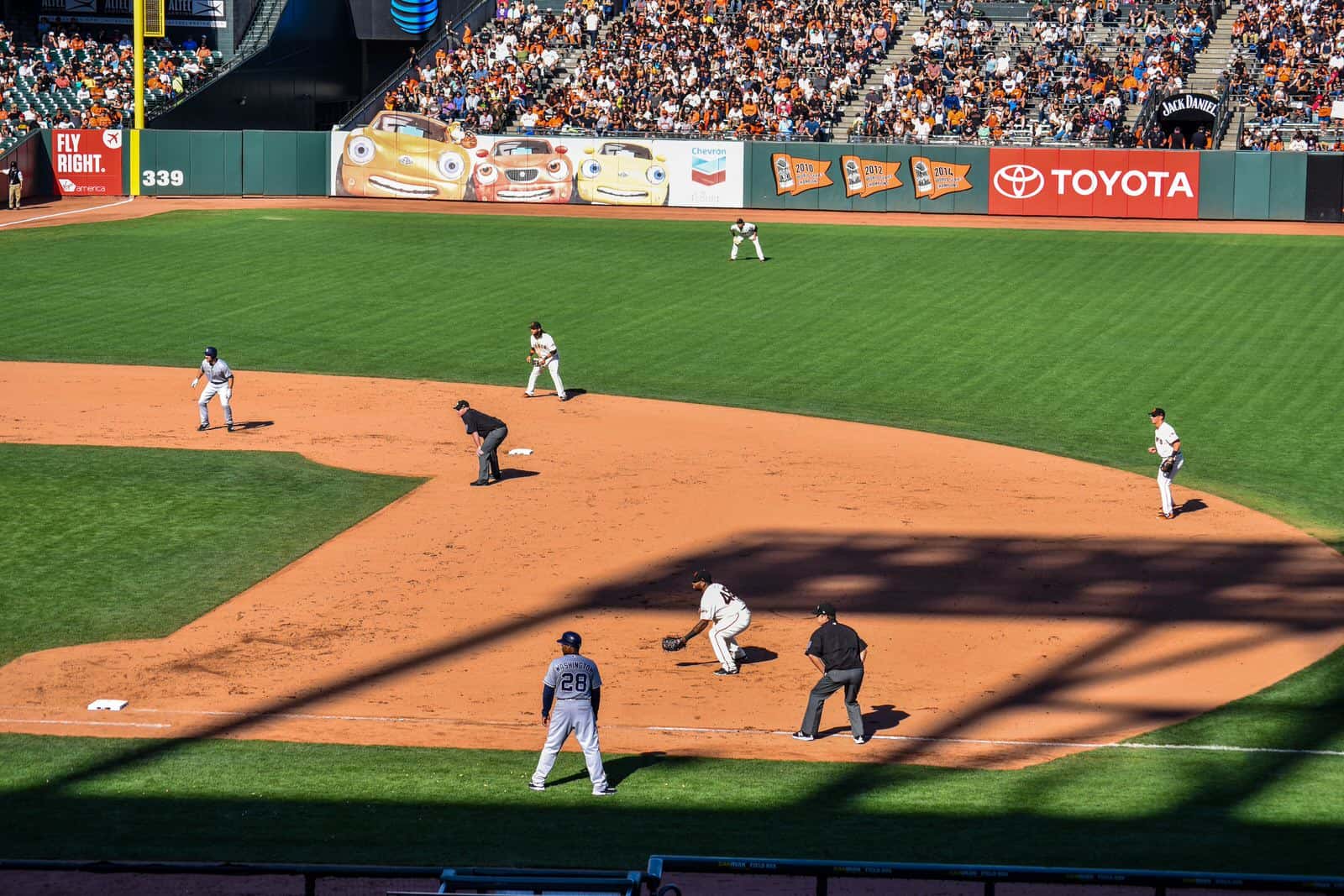 Outdoor advertising, as seen at this San Fransisco Giants game, can be seen on the outfield wall and stadium tunnels.