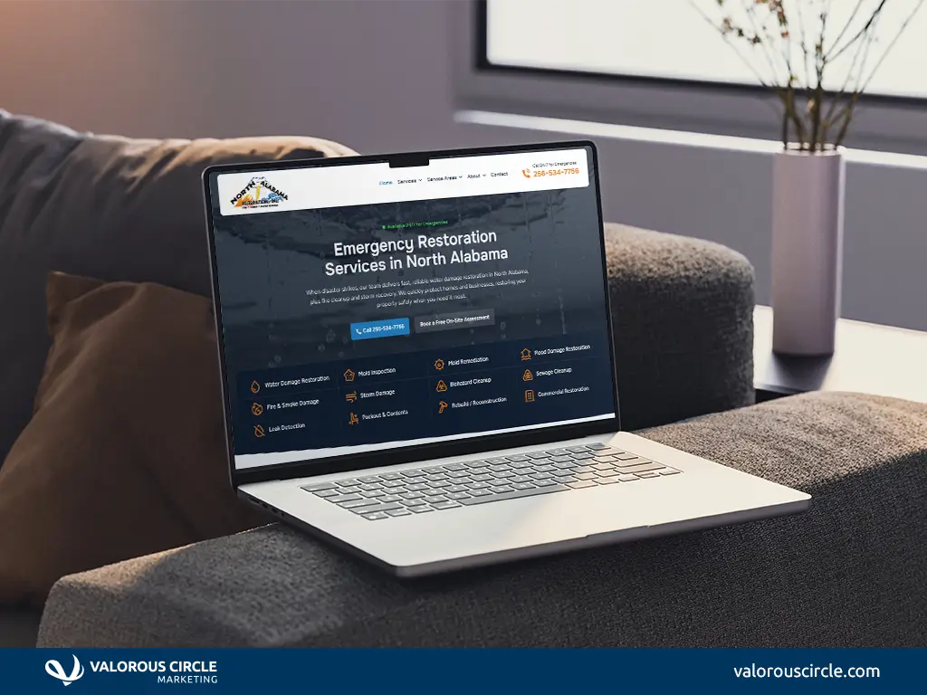 Laptop on a table with client's website homepage pulled up